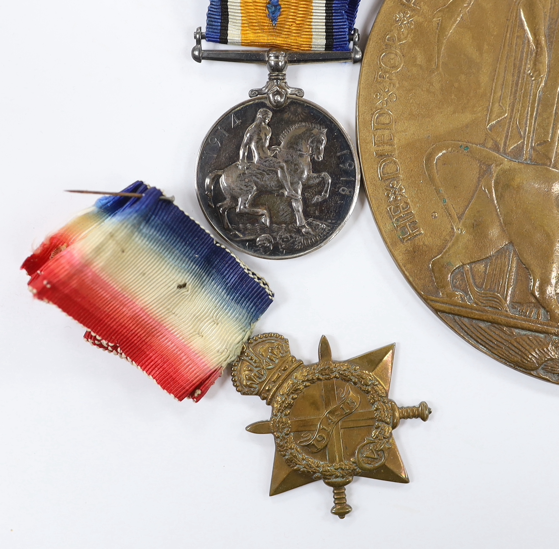 A First World War medal group to G.A. Wilkins A.B. R.N.V.R.; the Victory medal, the War medal and the 1914-15 star, together with the bronze Memorial Plaque in his name